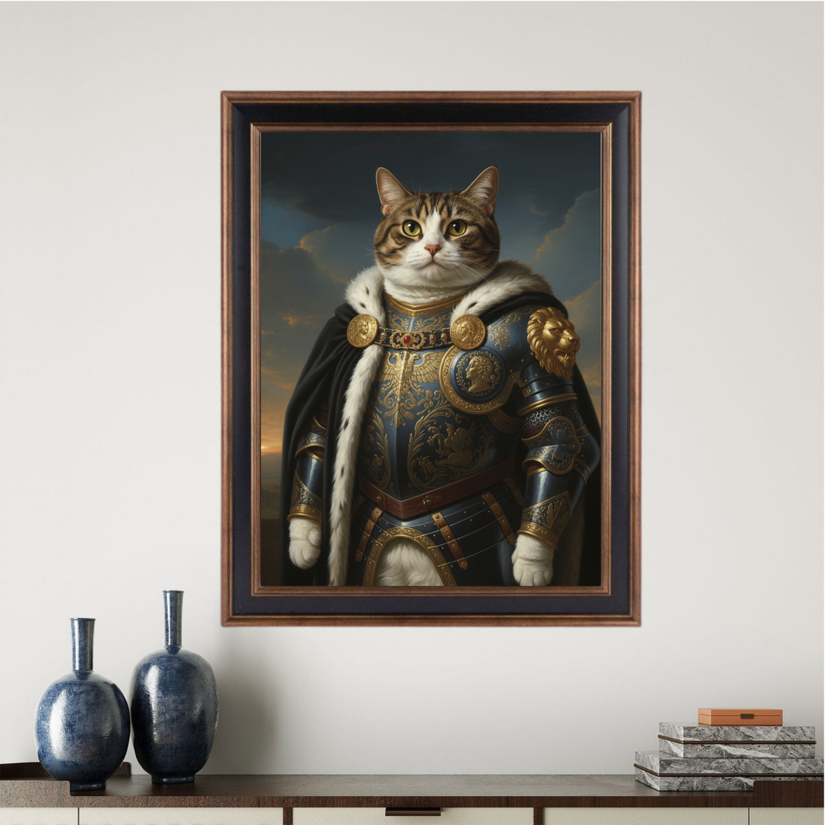 Framed oil-style portrait of a cat dressed in ornate blue and gold royal armor with a fur-lined cloak against a