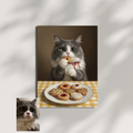 A framed print of a whimsical oil-style portrait featuring a grey and white cat eating a cookie at a checkered