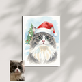 Watercolor portrait of a grey and white cat in a Santa hat, set against a snowy Christmas tree background on
