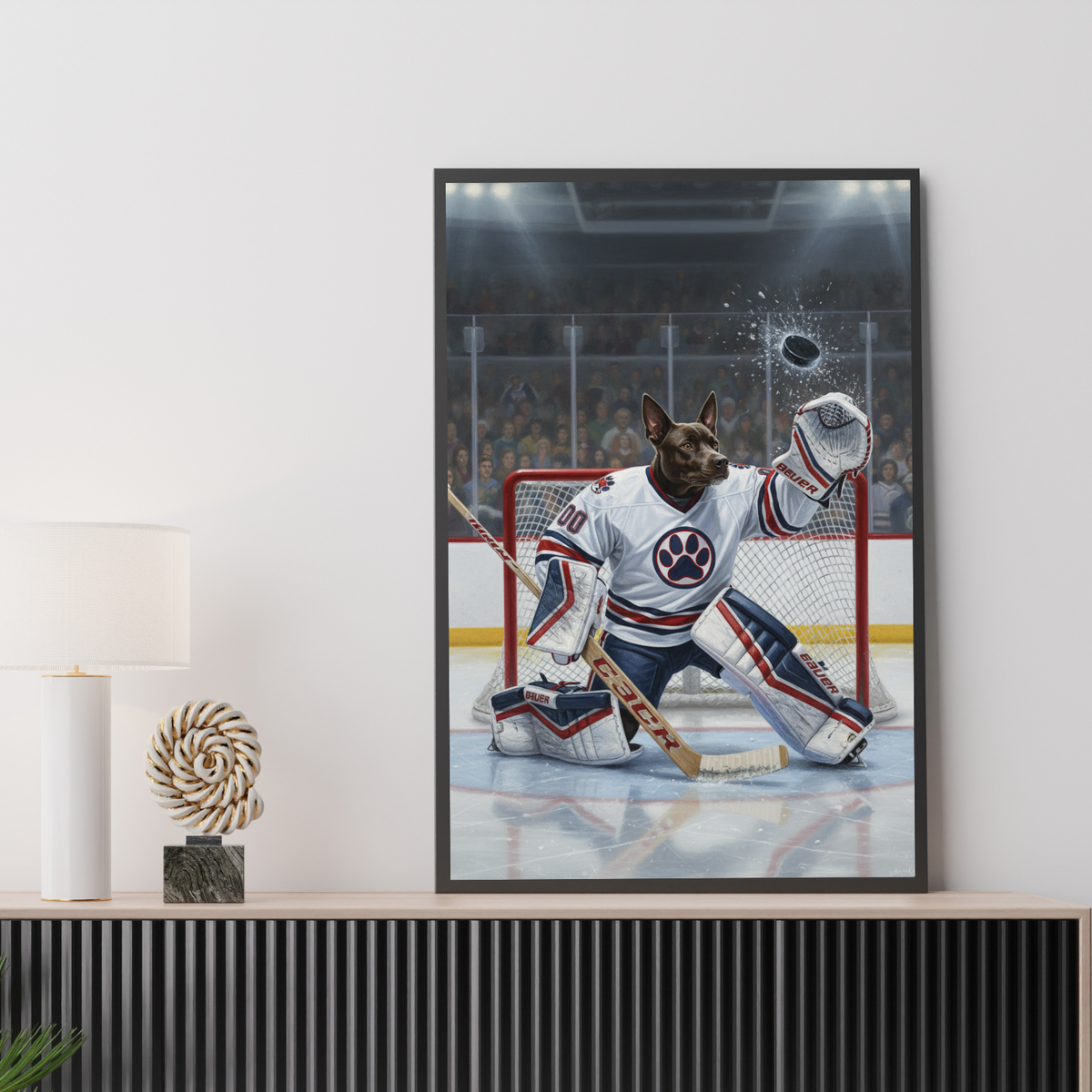 Framed oil-style print of a dog dressed as an ice hockey goalie making a save in a stadium, on a