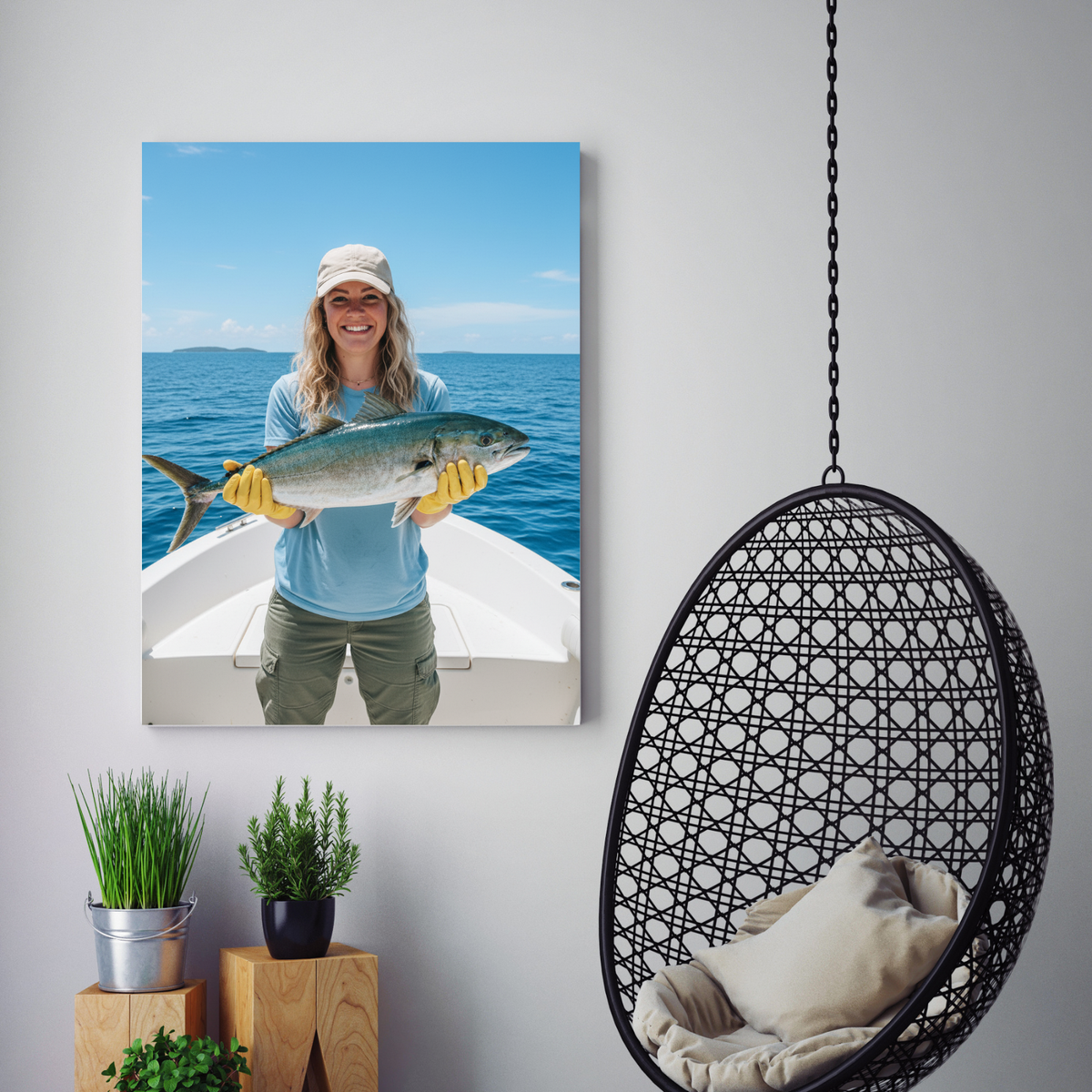 A framed portrait of a smiling woman in a blue shirt holding a fish on a boat, displayed in a
