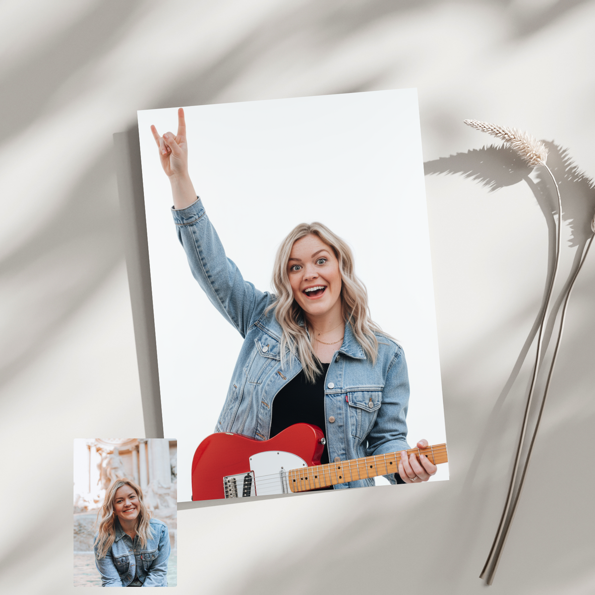 Framed print of a custom digital portrait of a woman in a denim jacket playing a red guitar and making