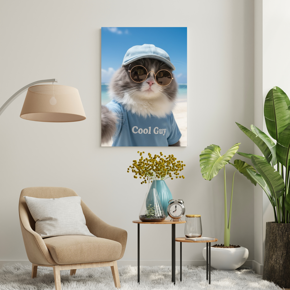 Framed print of a fluffy cat wearing a blue "Cool Guy" shirt and sunglasses at the beach, displayed in a