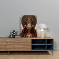 A framed print of a cat dressed as Padmé Amidala in royal red robes, seated on a throne in an
