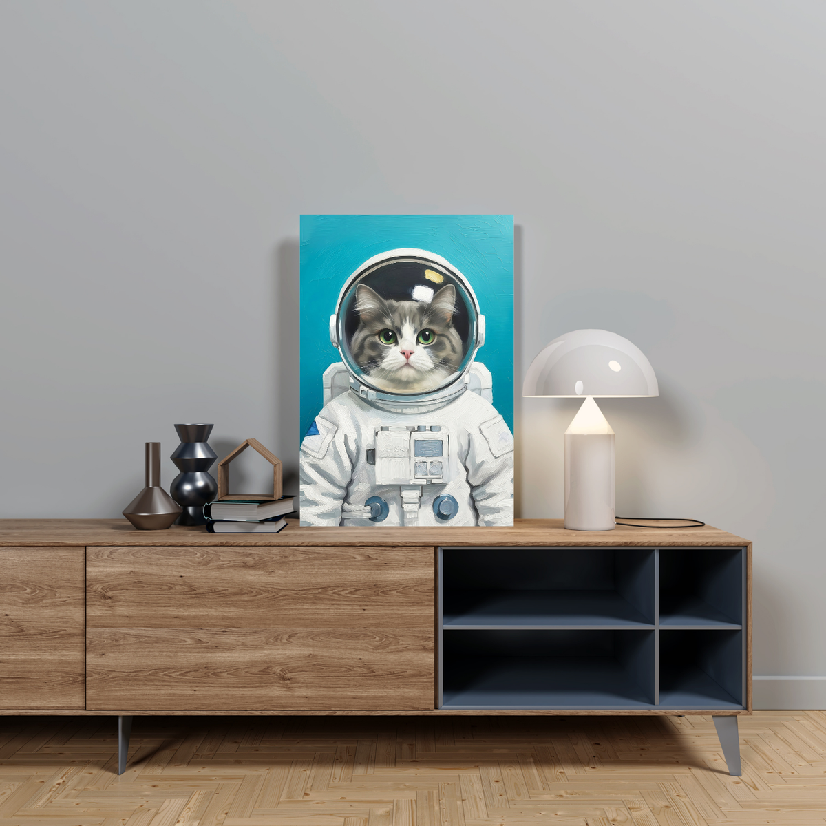 Framed oil-style portrait of a fluffy cat dressed as an astronaut against a bright blue background in a modern room.