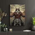 Framed print of an oil-style portrait featuring a cat in a leather jacket and sunglasses riding a motorcycle in a