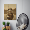 Framed print of an oil-style portrait featuring a fluffy dog dressed as an angler against a serene, vintage lake background.