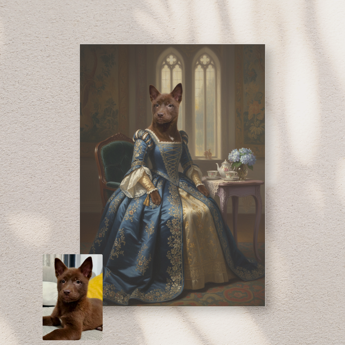 A framed print on a wall displaying an oil-style portrait of a brown puppy as a princess in a blue