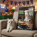 A framed print of a realistic-style cat chef in an apron, cooking wings in a kitchen, resting beside a real