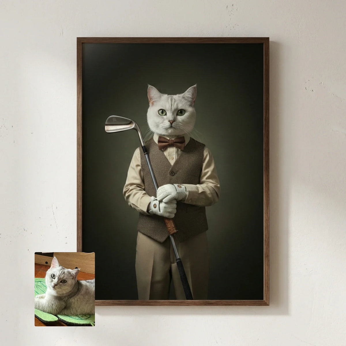 Framed portrait of a white cat dressed as a distinguished golfer in a brown vest and bowtie against a dark
